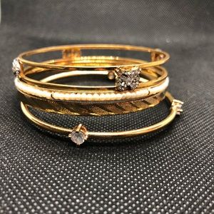 Set of 4 Juicy Couture gold bangle bracelets